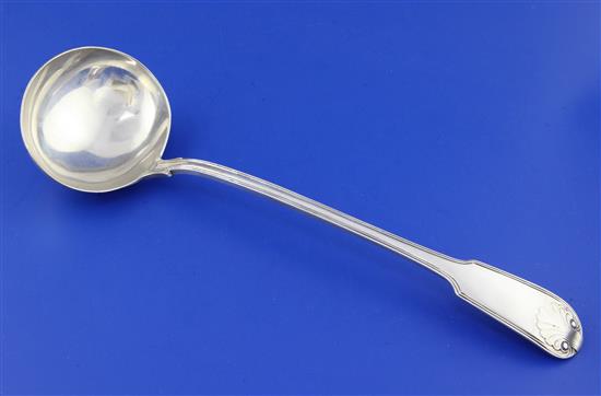 An early Victorian silver fiddle, thread and shell pattern soup ladle, 8.5 oz.